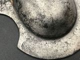 a metal object that is sitting on a table