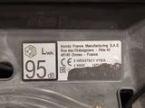a close up of a car ' s engine with a sticker on it