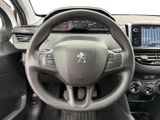 the interior of a car with a steering wheel and dashboard controls