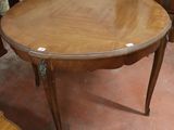 a wooden table with a wooden top and a wooden chair