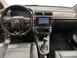 the interior of a car with a steering wheel, dashboard, and dash board