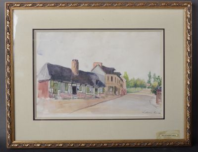 framed watercolor painting of a street scene with buildings and trees