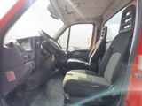 a picture of a red truck with the driver ' s seat up