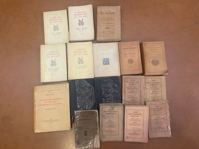 a lot of old books on the table together