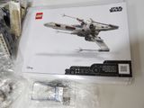 a box of lego star wars sets on a table