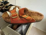 a pair of shoes that are sitting in a shoe box