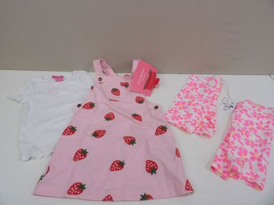 a pink dress and a white shirt with strawberries on it