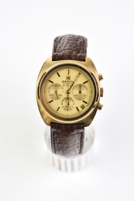 une image d'une montre en or sur fond blanc
