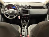 the interior of a car with a steering wheel, dashboard, and dashboard controls