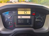 a car dashboard with a digital display on it