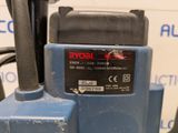 a close up of a blue machine with a black handle