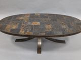 an image of a coffee table with a stone top and metal legs