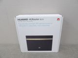 La boîte du nouveau routeur Huawei est ouverte.