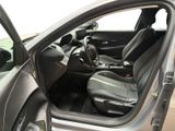 the interior of a car with the door open and the driver ' s seat up