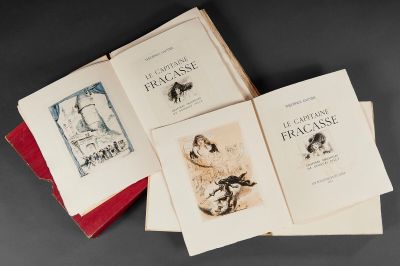 plusieurs livres sont empilés sur une table