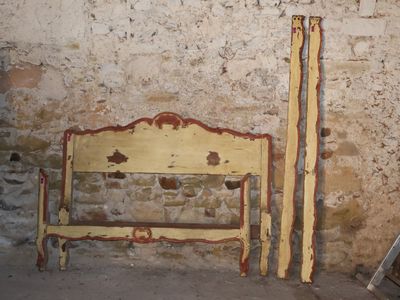 two pieces of furniture sitting next to each other in a room