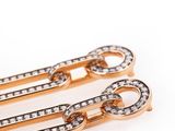 an image of a pair of gold and diamond hair clips