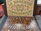 two signs that are sitting on a table