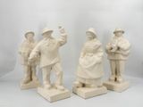 three white statues of people standing next to each other on a white surface