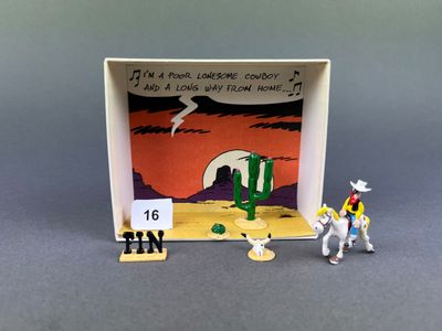 une petite boîte sur laquelle figure l'image d'un homme à cheval