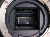 a close up view of a camera lens with a small lens in it