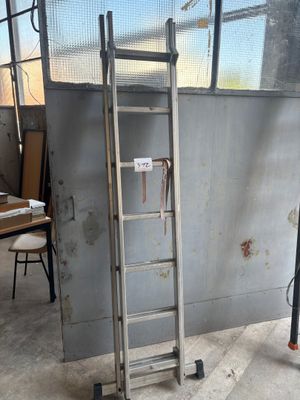 a ladder leaning up against a wall in a room