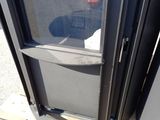 a close up of a door with a glass window