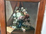 une photo d'une photo d'un vase de fleurs sur une table