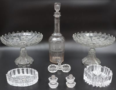a lot of glass items that are on a table