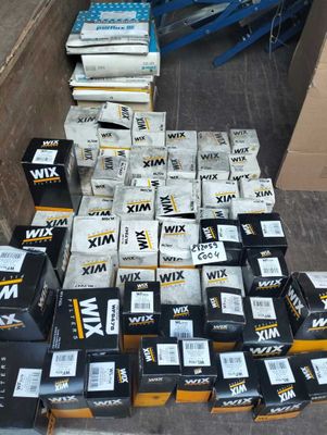 several boxes of various types of electronic devices are stacked on top of each other