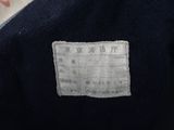 a picture of a label on the back of a jacket