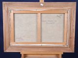 a picture of a painting on a easel with a piece of paper