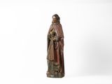 une statue représentant un homme tenant un crâne entre ses mains