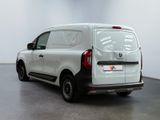 the rear of a white van is parked in a white room