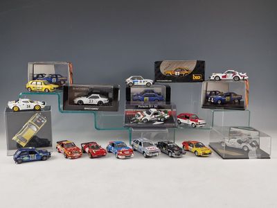 a lot of toy cars on display in a display case
