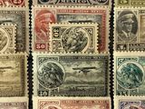 several different types of stamps are displayed on a black surface