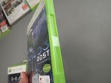 a person holding a green case with a picture on it