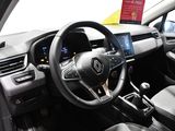 a steering wheel and dashboard of a car in a car showroom