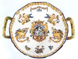 a plate with a design on it on a white surface