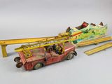 an image of a toy fire truck with a crane on top of it