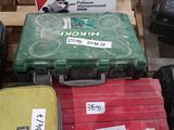 several pieces of luggage sitting on top of a pallet next to a pile of boxes