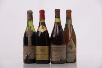three bottles of wine are lined up on a table