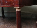 a wooden table with a drawer on it on a hard wood floor