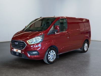 a red ford transit van parked in a large room