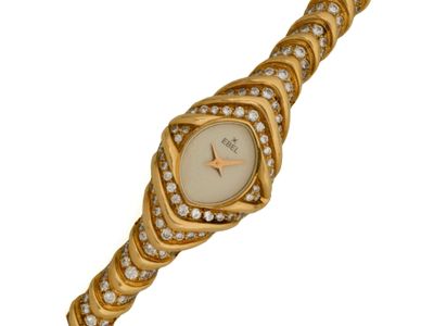 EBEL. MONTRE bracelet de DAME en or (750‰), cadran gaufré de… - Photo 1