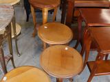 many tables and stools that are sitting in a room