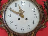 a clock that is hanging on the wall in the room