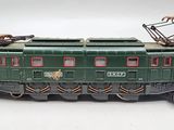 a toy train on a white surface with a white background
