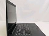 a black laptop with a black keyboard on a white surface