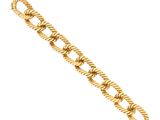 a close up of a gold bracelet on a white background
